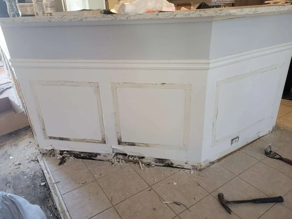 Water damage and mold on kitchen during Storm Damage Restoration in Holliston